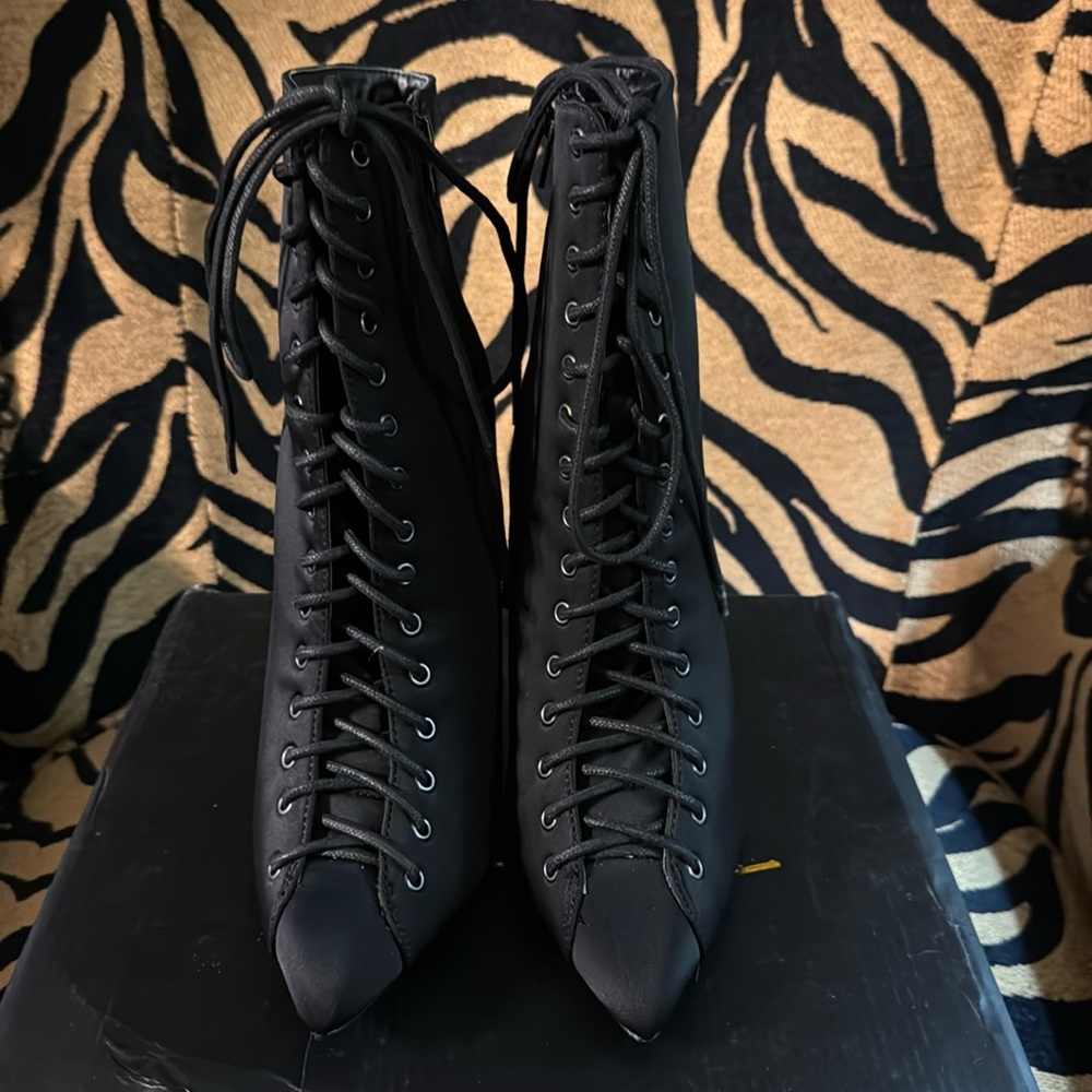 Black Lace up Boots
Size 8 1/2